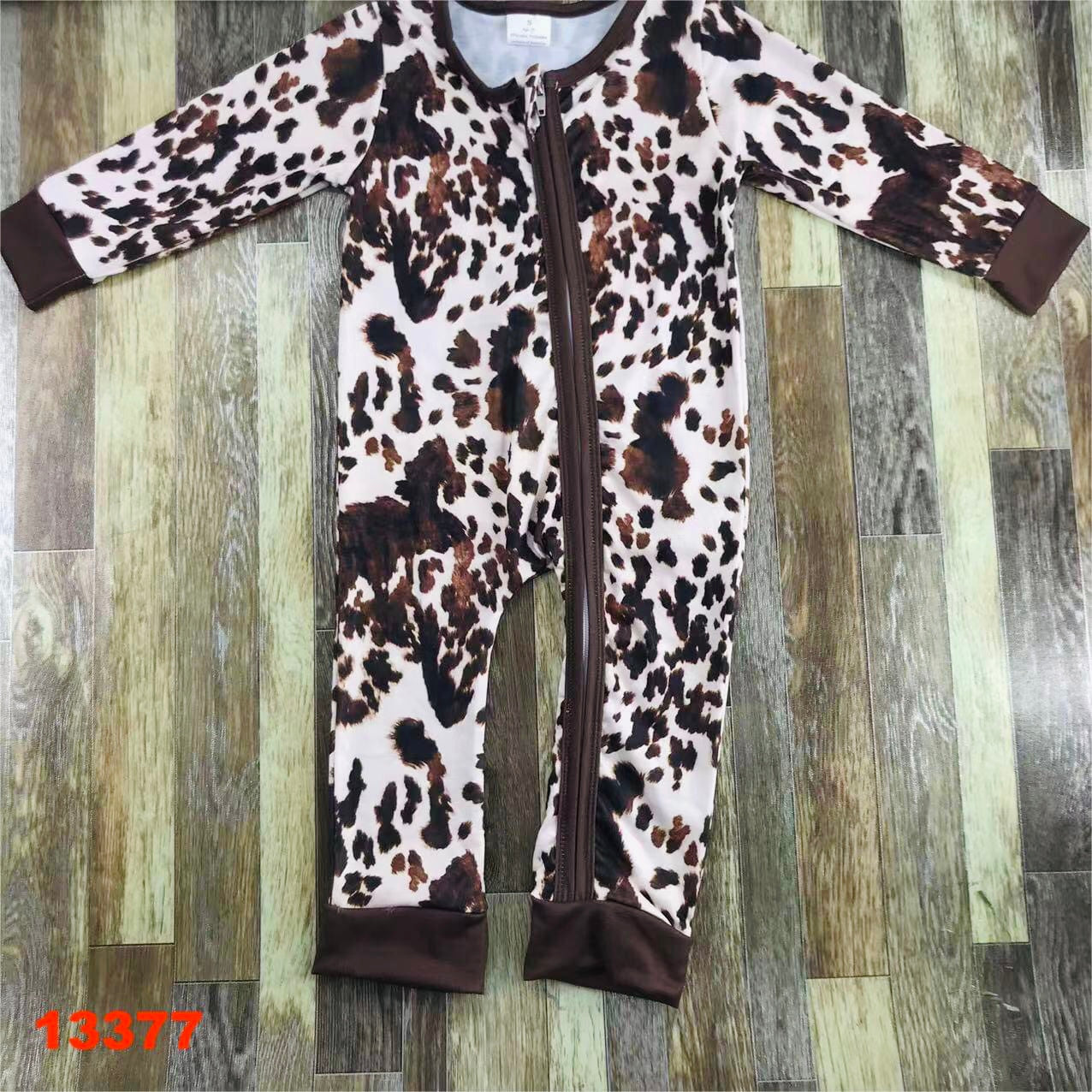 Cow Hide zip up romper