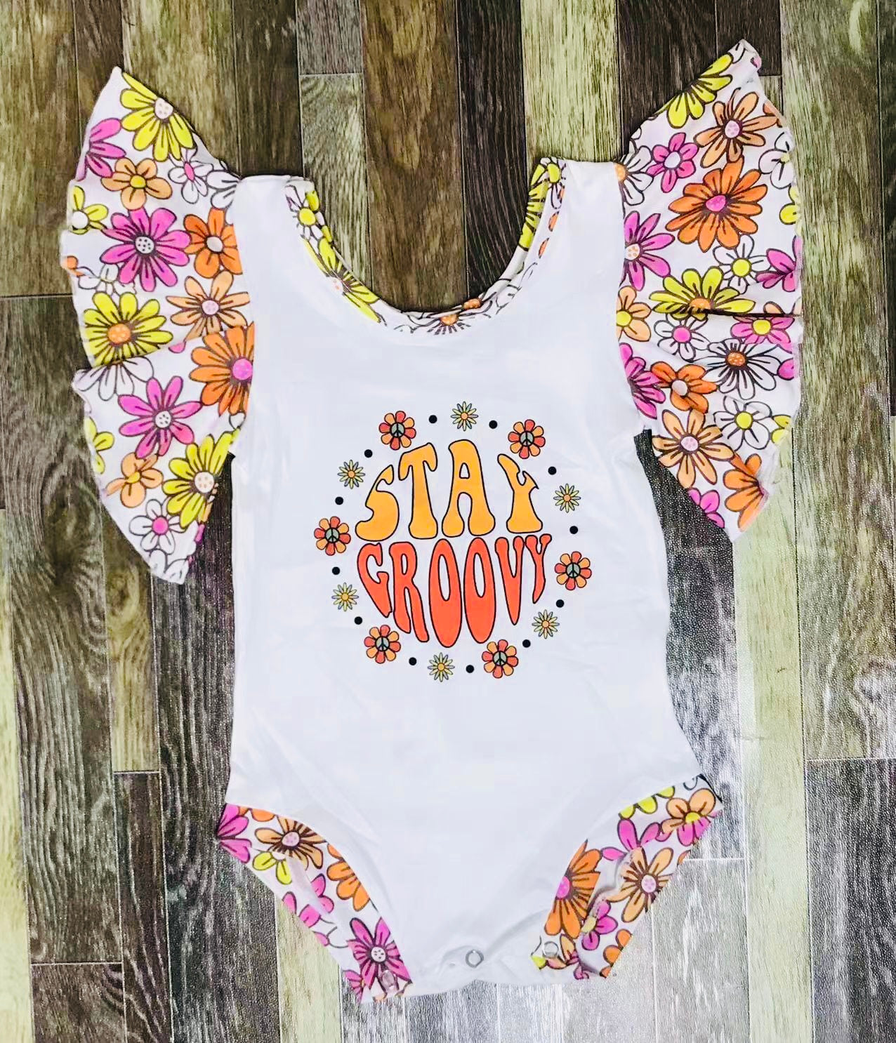 Stay Groovy angel sleeve romper