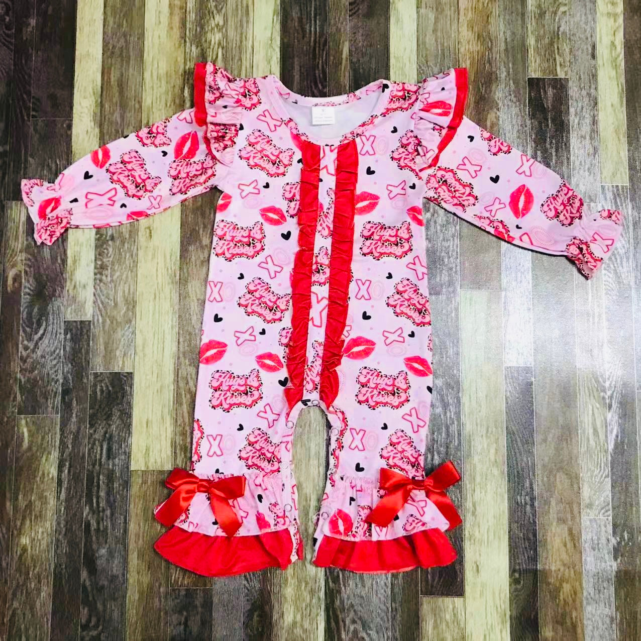 Hugs and Kisses ruffle romper